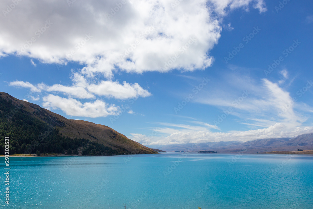 Fototapeta premium view of Tekapo lake on a sunny day, New Zealand