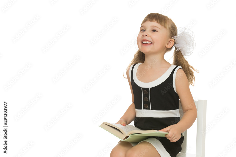 Little girl with a book.Isolated over white background Little girl with a book.Isolated over white background