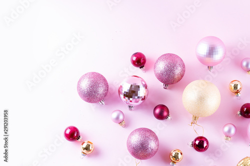 Christmas decorations on pink