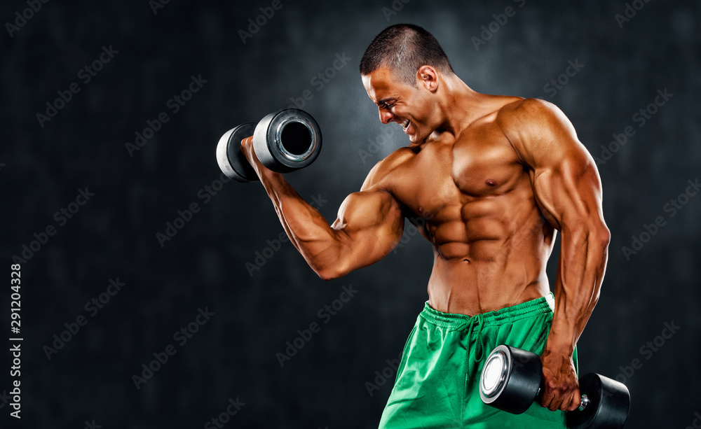 Handsome Young Bodybuilder Lifting Weights