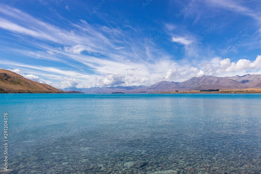 view of Tekapo lake on a sunny day, New Zealand