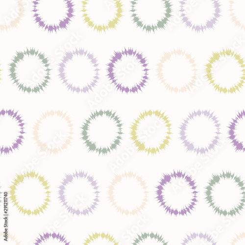 Dotty shibori tie dye sunburst circle stripe background. Seamless pattern on bleached resist white textile. Pastel dyed ink ring batik all over print. Trendy retro gender neutral kid fashion swatch.