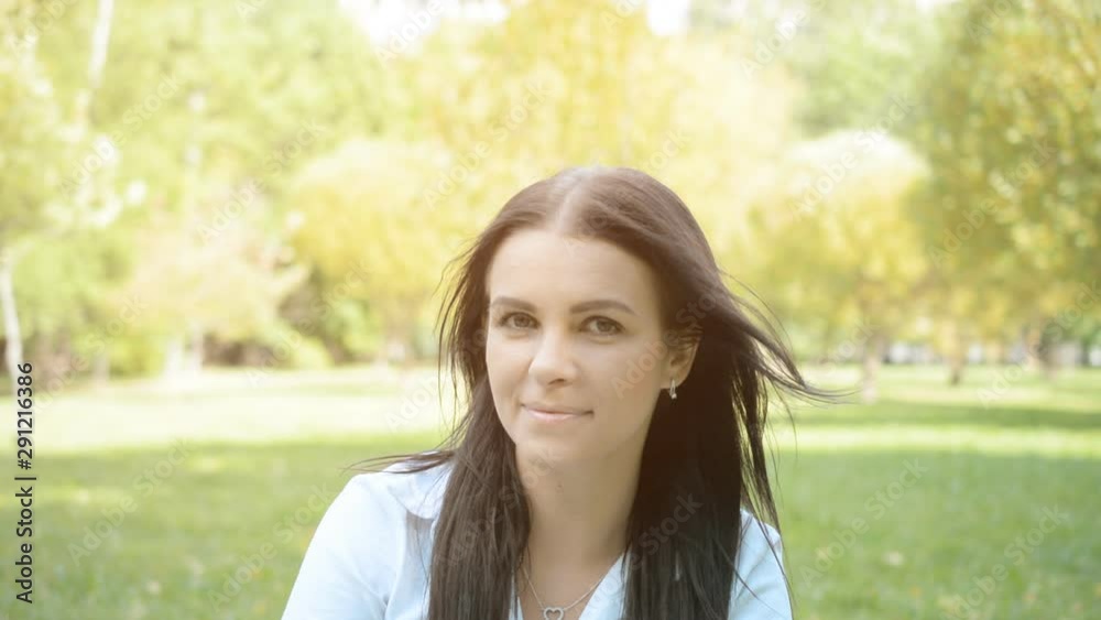 portrait of a beautiful girl in the park