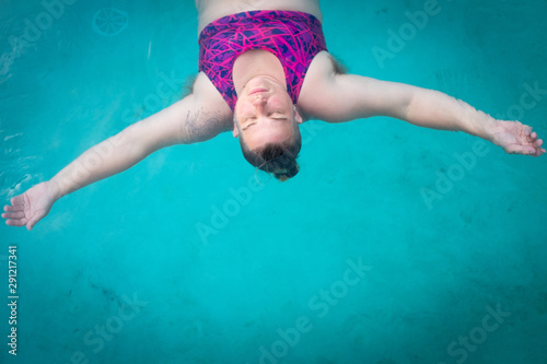 Gay woman in swimming pool photo