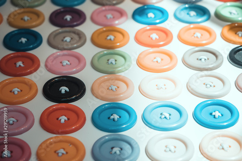 Colorful button in vintage style; button background
