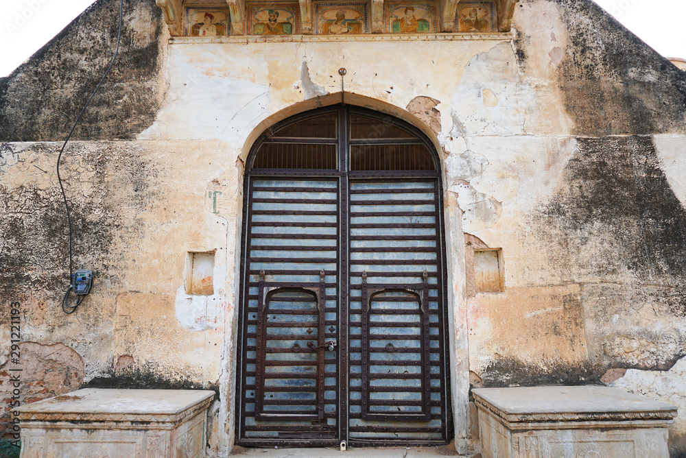 Fototapeta premium Local house doors in Mandawa, Jaipur, India. Traditional architecture is Haveli