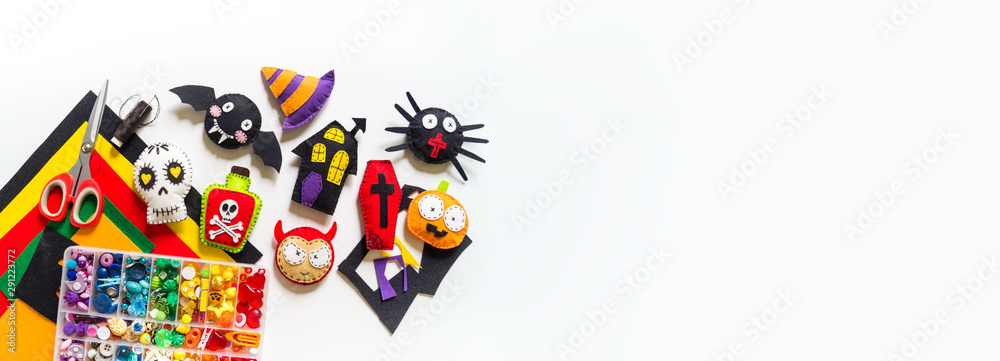 Workshop halloween decor felt toy. Spider Bat Black Cat Devil Skull Skeleton on a white background. Copy space