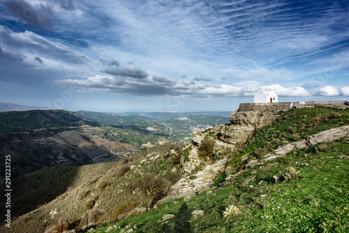 Mountains and small house photo