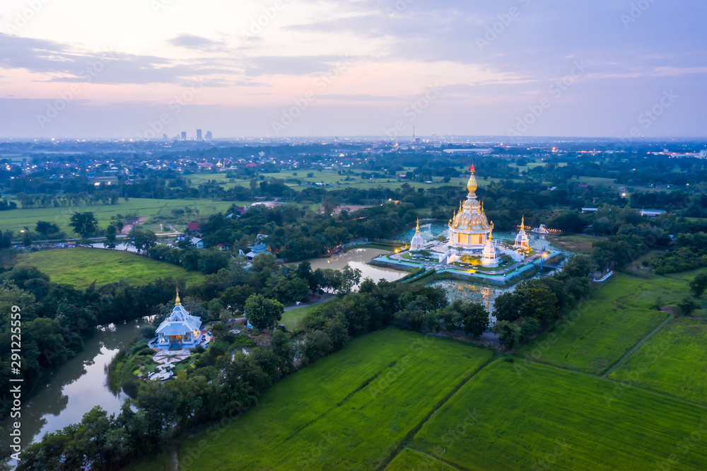 Aerial view from drone of Wat thung setthi temple with sunset sky at Khon kaen in Thailand.