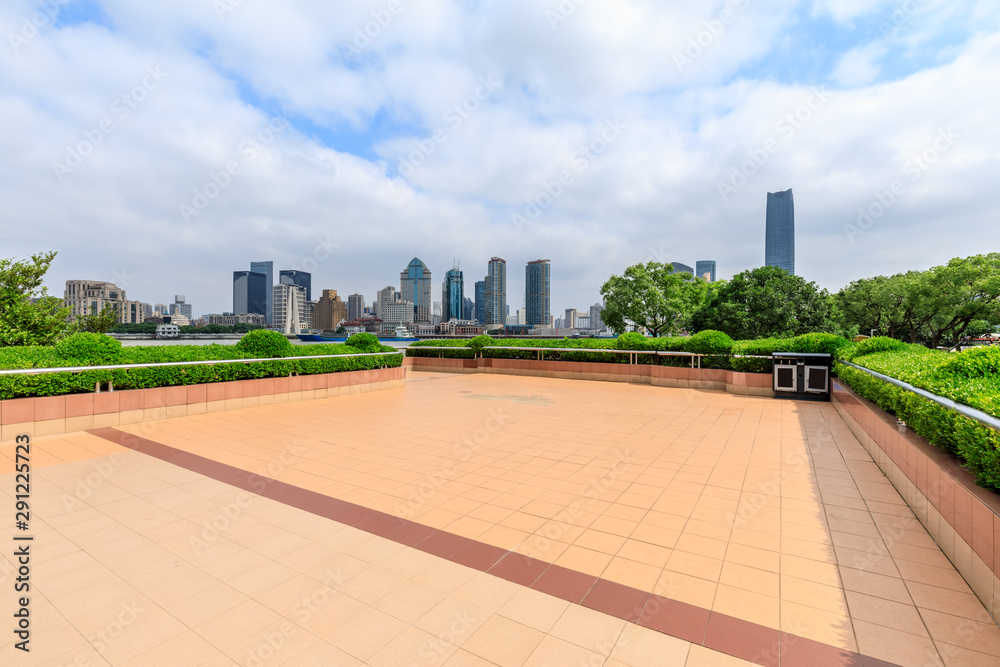 Shanghai skyline and empty square floor in city park