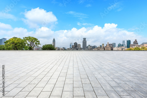 Shanghai skyline and empty square floor in city park