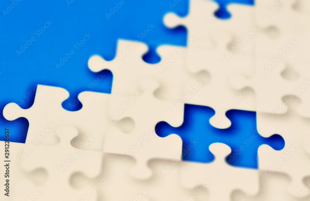 the missing piece of puzzle.paper concept .blurred the missing piece of puzzle.paper concept .blurred