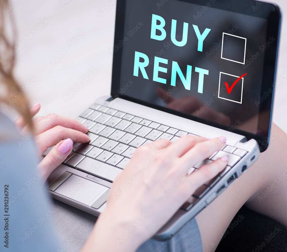 Businesswoman facing dilemma of buying versus renting Businesswoman facing dilemma of buying versus renting