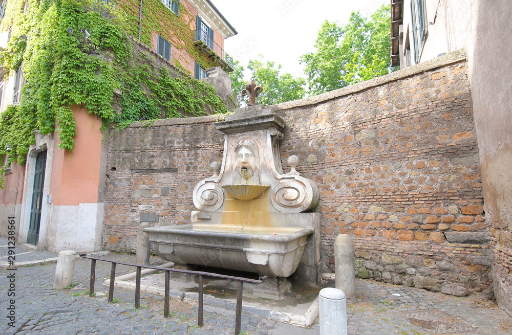 Street water fountain Rome Italy