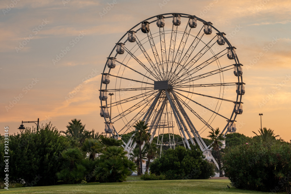 Ferris wheel at the Park Giardinetti at sunrise, Olbia, Sardinia, Italy