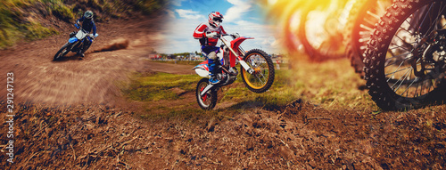 Banner rider on mountain dirtbike enduro participates in motocross, jumps on springboard against background dirt. Concept extreme action sport racing photo