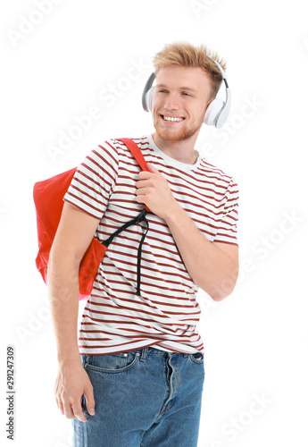 Handsome young man listenin...
