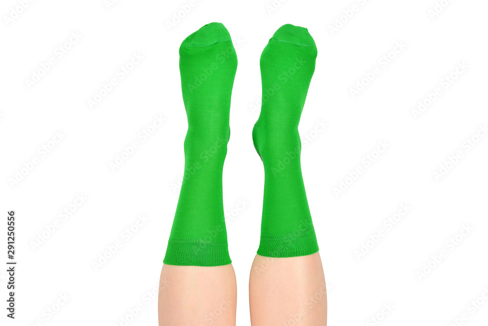 Woman in green socks isolated on white background. Top view. Woman in green socks isolated on white background. Top view.