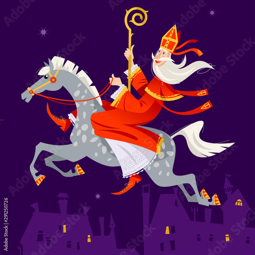 Santa Claus (Sinterklaas) rides a horse over the city at night. Christmas in Holland.