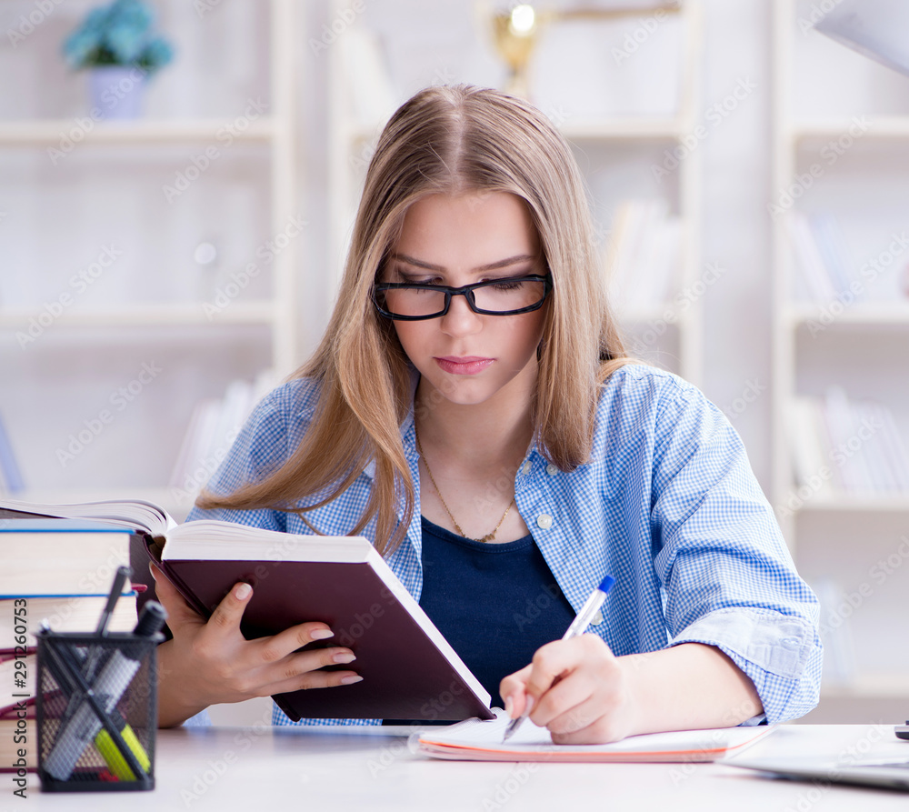 Young teenage female student preparing for exams at home Young teenage female student preparing for exams at home