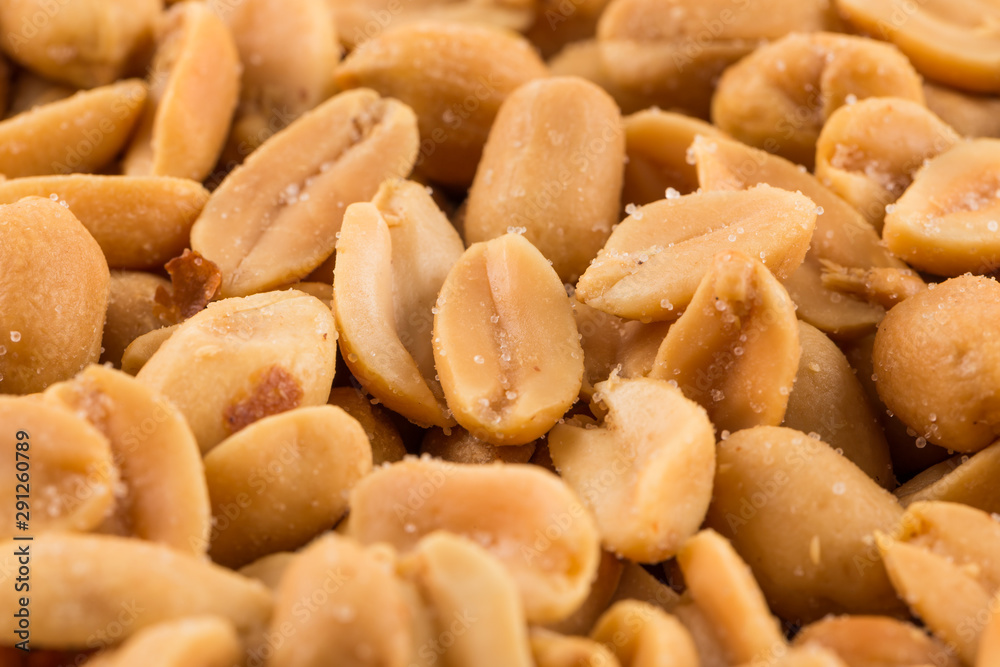 large amount of peeled salted peanuts large amount of peeled salted peanuts