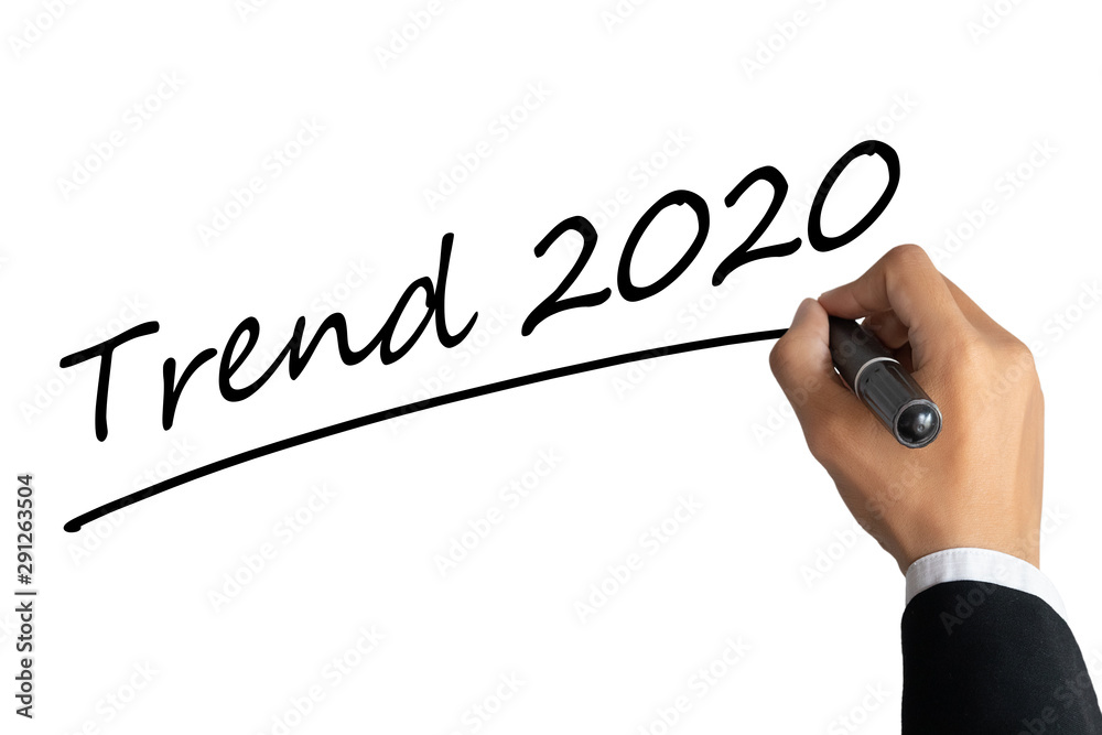 business man hand writing word trend 2020 with black color marker pen  isolated on white background.TRENDS 2020 Business Concept Stock Photo |  Adobe Stock