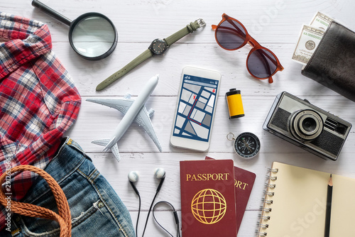 flat lay of travel item accessory, essential vacation items accessory. travel concept background photo