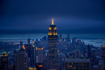 Wandcirkels Empire State Building Lichten van New York bij nacht  © surangaw