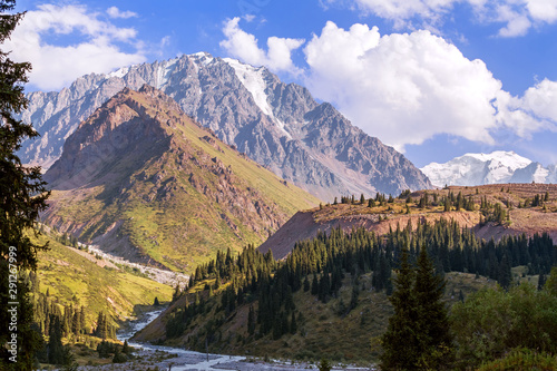 View of the beautiful Left Talgar mountain valley with river, rocks and forest in Tian Shan mountains near Almaty city; best place for active lifestyle, hiking and trekking in Kazakhstan.