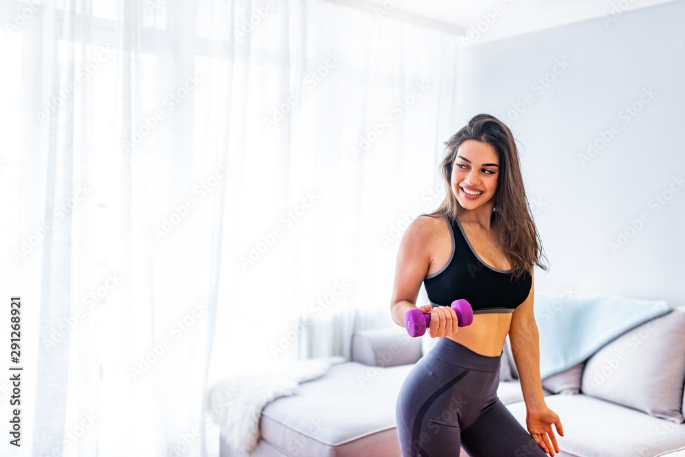 fitness woman working out with dumbbells fitness woman working out with dumbbells