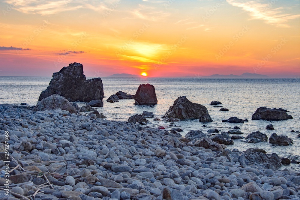 Sunset rocky beach Sunset rocky beach