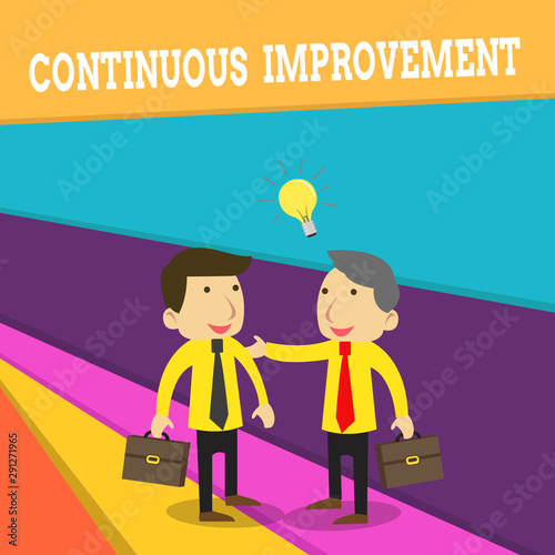 Word writing text Continuous Improvement. Business photo showcasing ongoing effort to improve products or processes Two White Businessmen Colleagues with Brief Cases Sharing Idea Solution