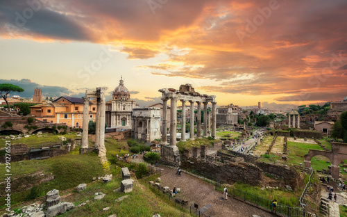 Image of Roman Forum in Rome, Italy during sunset in sunny day. View of Roman Forum with the Temple of Saturn and Vespasian, Rome, Italy. Roman Forum is one of the main travel destinations in Europe.
