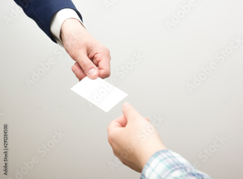 business executive exchanging business card blank. Copy space