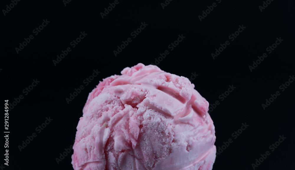Strawberry ice cream scoop on black background, Closeup Front view Food concept. Strawberry ice cream scoop on black background, Closeup Front view Food concept.