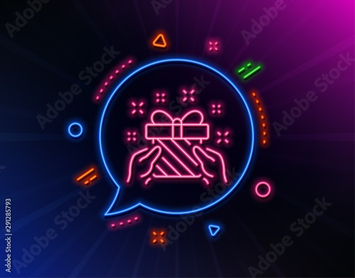 New year present line icon. Neon laser lights. Christmas gift box sign. Surprise symbol. Glow laser speech bubble. Neon lights chat bubble. Banner badge with gift icon. Vector