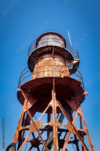Rusty old lighthouse tower