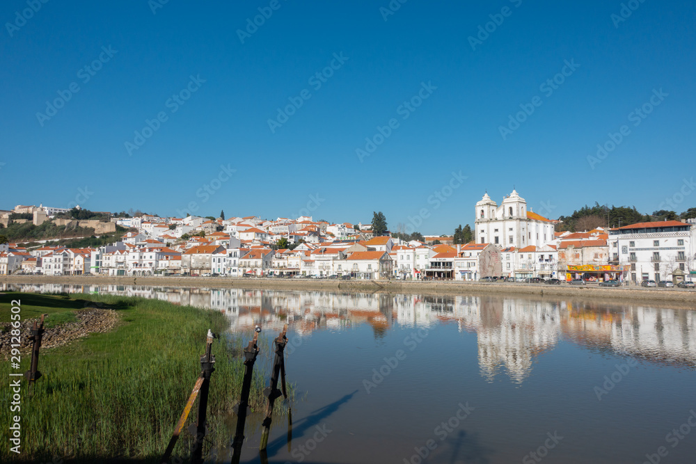 View of Alcacer do Sal cityscape from the other side of the Sado river