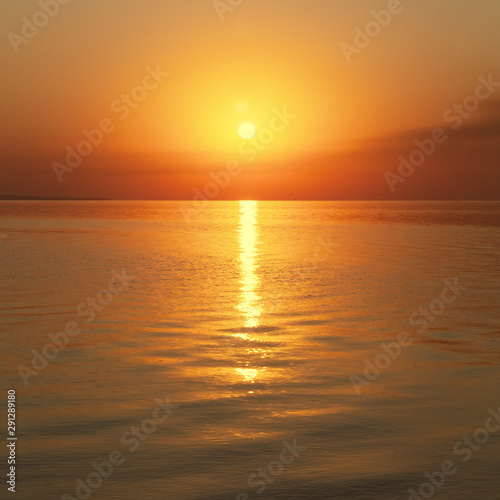 early morning sunrise on a choppy river / wind early spring landscape © ml1413