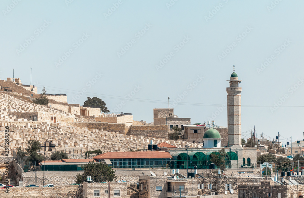 View from the ramparts to the buildings on the Mount of Olives and Ras al Amud Mosque near the Dung Gate in the Old City in Jerusalem, Israel