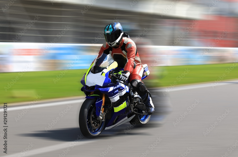 Racer on a sports bike rides on the race track