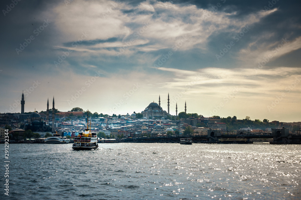 Ferry on sea with Suleymaniye Mosque in the background
