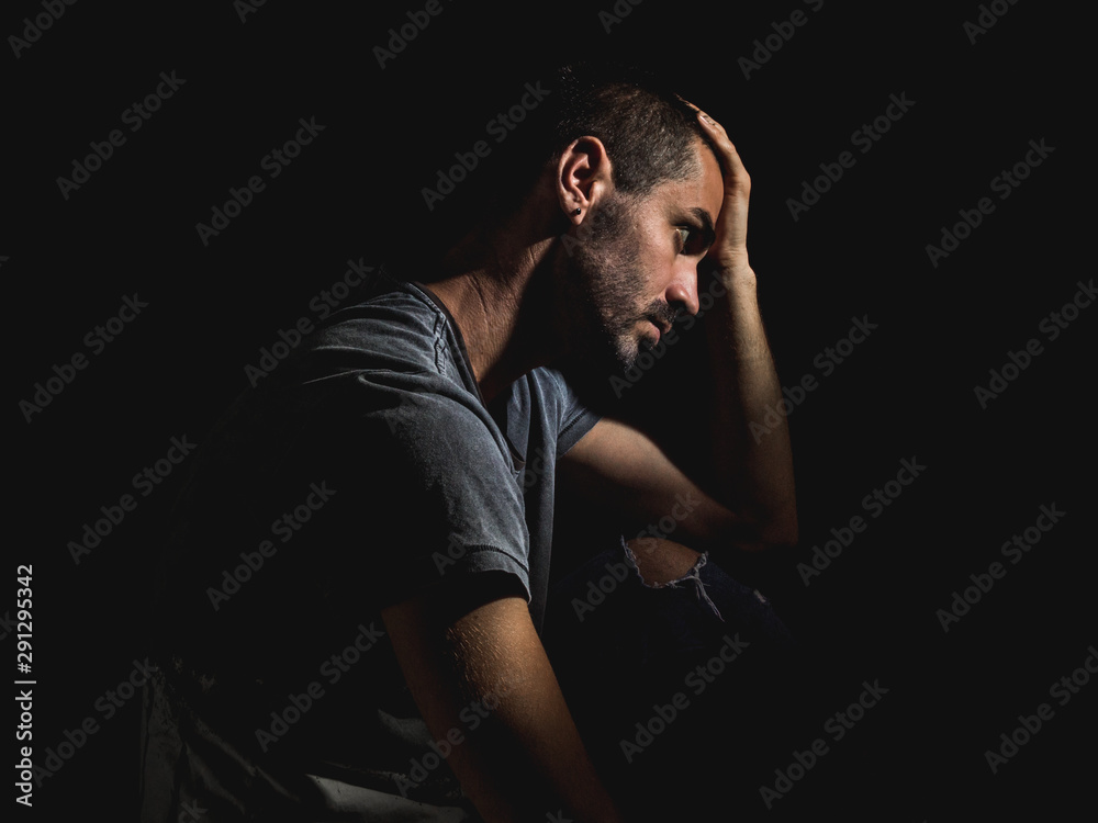 young guy alone sad and depressed