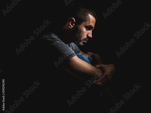 young guy alone sad and depressed © Fran Now