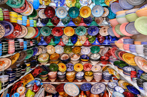 Colorful crafts shop with ceramic art on a traditional moroccan market, Morocco in Africa