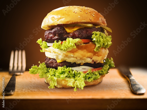 Big and scrumptious hamburger double decker detail or close-up