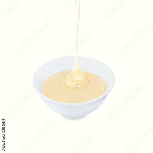 Pouring condensed milk with sugar in a bowl.