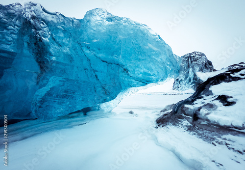 Iceberg sculpture in frozen sea