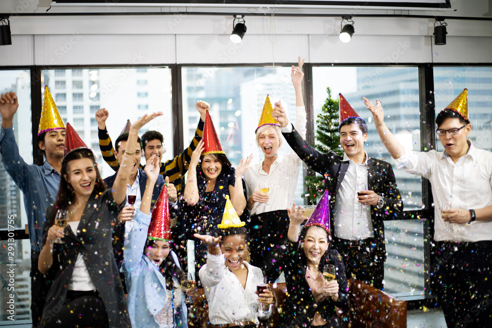 Business persons happy new year party in the offices. Business persons happy new year party in the offices.