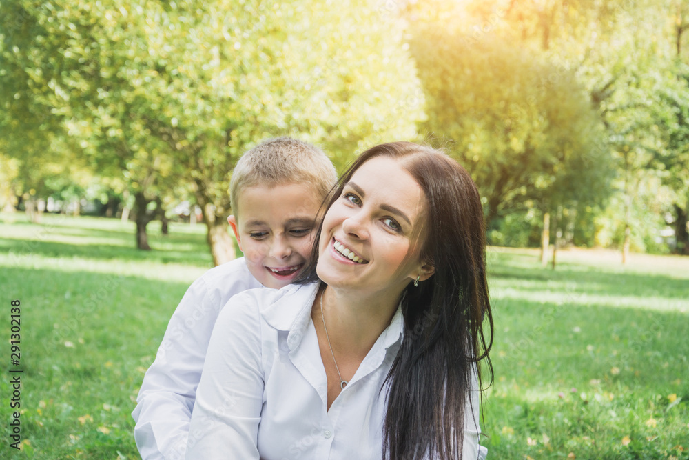 happy family concept, mom and her son outdoors happy family concept, mom and her son outdoors